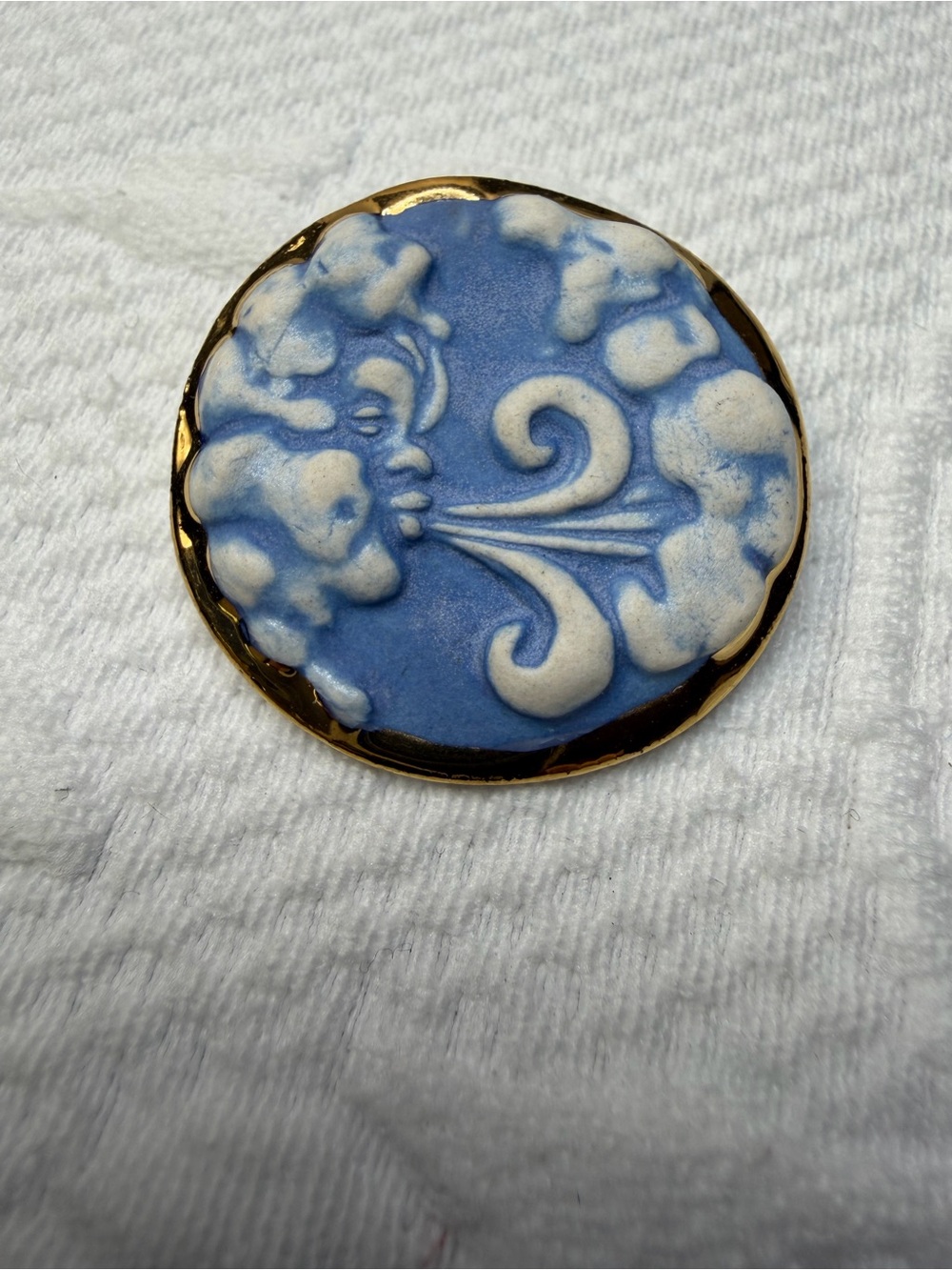 Blue and Cream Wind Face Ceramic Pin with Gold Trim